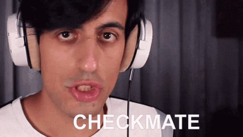 A close-up of a man, Davie504, with dark hair wearing white over-ear headphones, looking directly into the camera with a deadpan, intense expression as the word "CHECKMATE" appears in bold white text over his mouth.